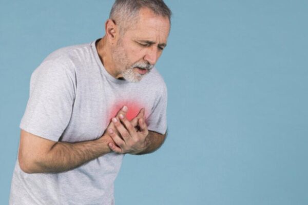 076778700_1605444026-senior-man-having-chest-pain-blue-background_23-2148032380
